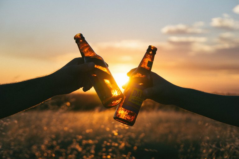 Beer Bottles Clinked By Sunset - Drink Driving Lawyers