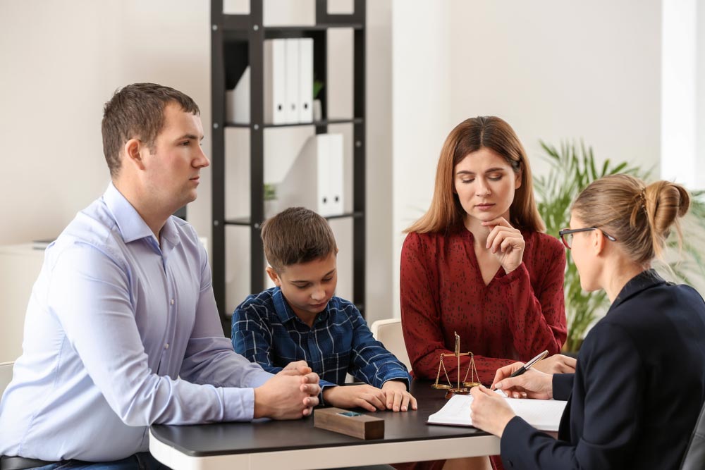Parents Discussing Child Support With A Lawyer